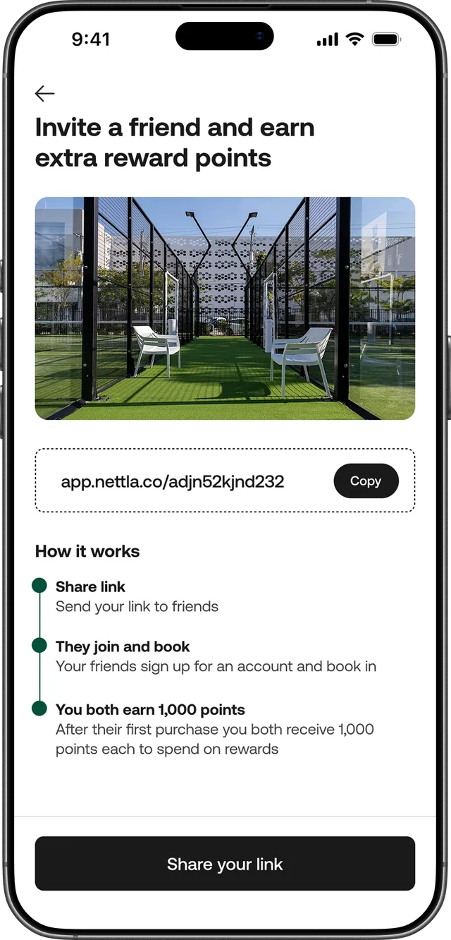 Invite a friend screen showing a shareable referral link and the three-step how-it-works: share link, they join and book, you both earn 1,000 points