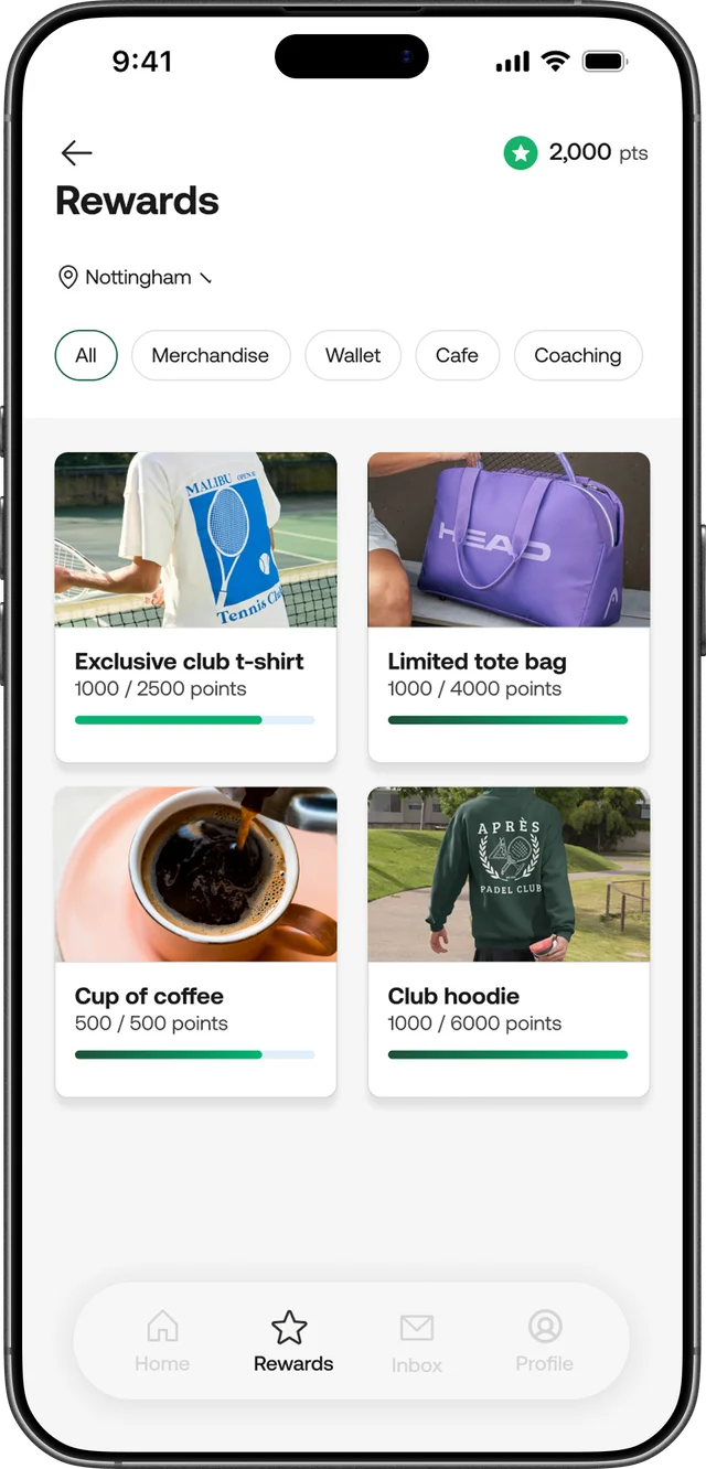 Rewards screen listing merchandise, café and coaching rewards with points progress bars